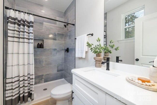 Building Photo - Brand New 3BR 3BA Home w/ Fenced Backyard • Quartz Island Kitchen in Charlotte