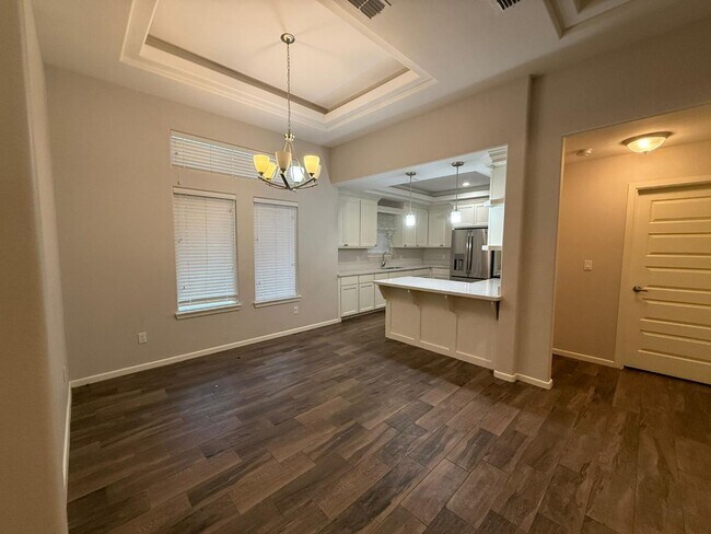 Building Photo - 1321 W Combes Ave