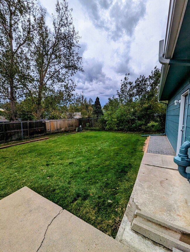 Large backyard with patios - 4666 S Garland Way