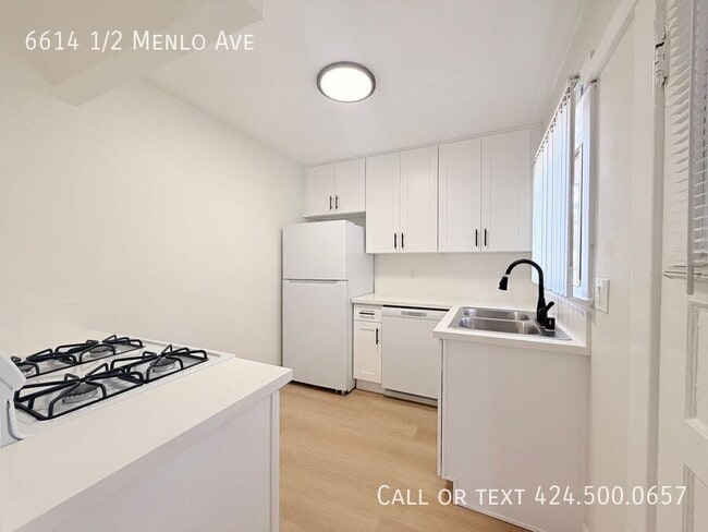 Building Photo - 6614 1/2 Menlo Ave-