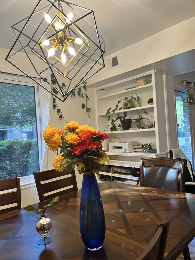 dinning room with built in bookshelf - 9705 Kings Crown Ct