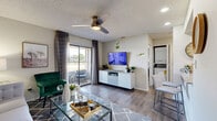 Located at 3595 Misty Oak Drive in Melbourne, FL, this one-bedroom, one-bathroom residence offers a thoughtfully designed single-floor layout that maximizes every square foot. The combined living and dining area serves as the heart of the home, featuring wood-style flooring, a ceiling fan, and a sliding glass door that floods the space with natural light and opens onto a private balcony with outdoor views. The living area provides a comfortable, open feel, while the adjacent dining space features a chair rail accent wall, adding a classic architectural detail.

The kitchen is efficiently laid out with white cabinetry, granite countertops, stainless steel appliances, and a dedicated pantry for additional storage. In-unit laundry is conveniently tucked nearby. The spacious primary bedroom accommodates a generous furniture arrangement and includes closet access, wood-style flooring, and a window with curtains for natural light. Three closets throughout the home provide ample storage.

The bathroom is clean and functional, featuring a tiled tub-shower combination, a white vanity with storage, and wood-style flooring. With a hallway connecting the rooms seamlessly, this well-organized residence offers practical, comfortable living in a convenient Melbourne location.