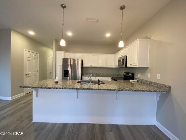 Building Photo - 9012 Banyan Beach Dr