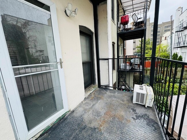 Building Photo - 25-38-38 22nd St