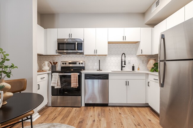 Newly Renovated Kitchen with Stainless Steel Appliances - Deep Deuce at Bricktown Apartments