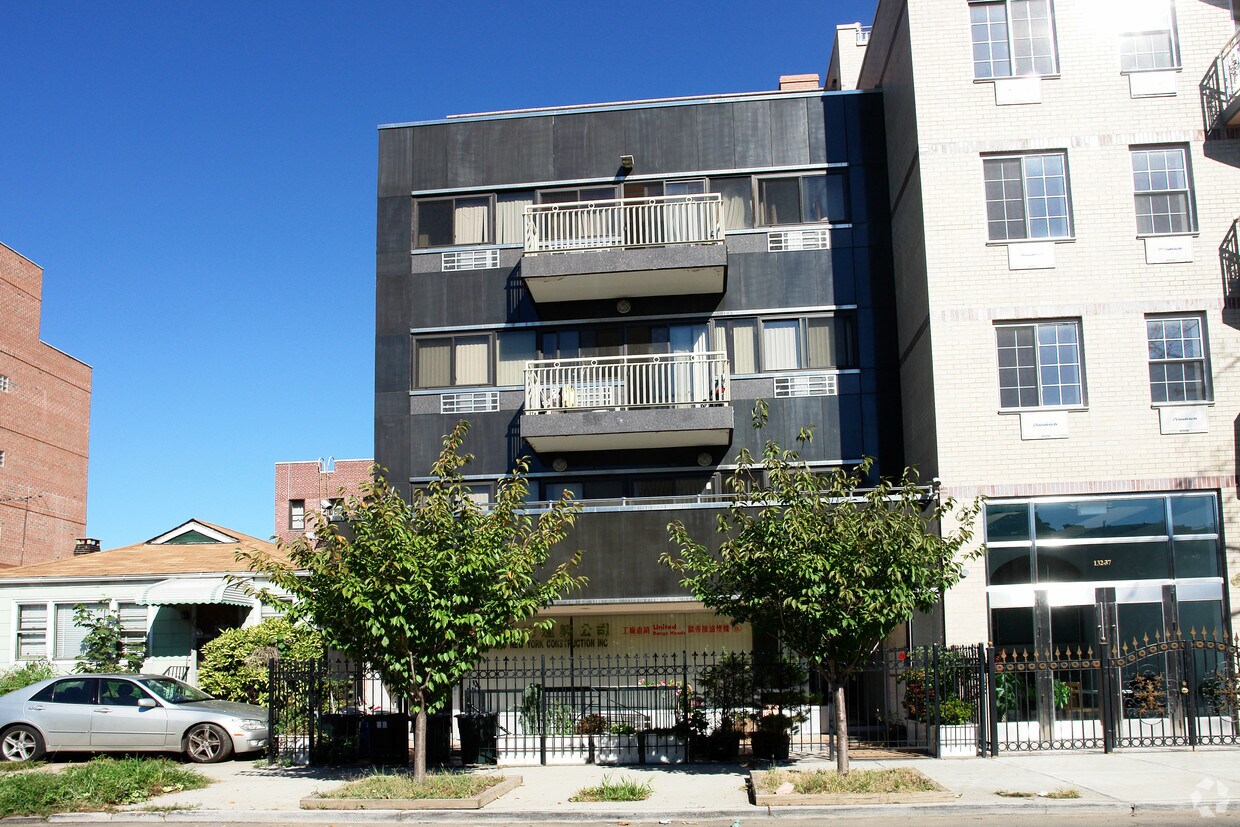 Building Photo - 13233-13235 Pople Ave