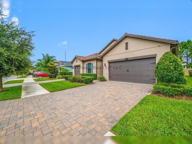 Building Photo - Luxury 4-Bedroom Home with 3-Car Garage in Gated Promenade at LakePark