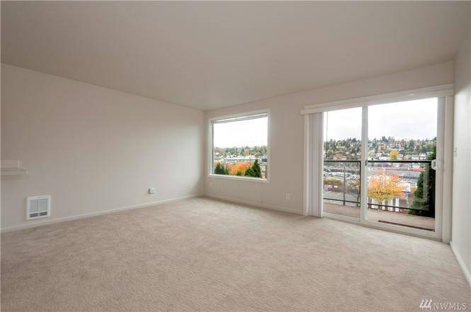 Living room. City View. - 3420 15th Ave W Unit 204