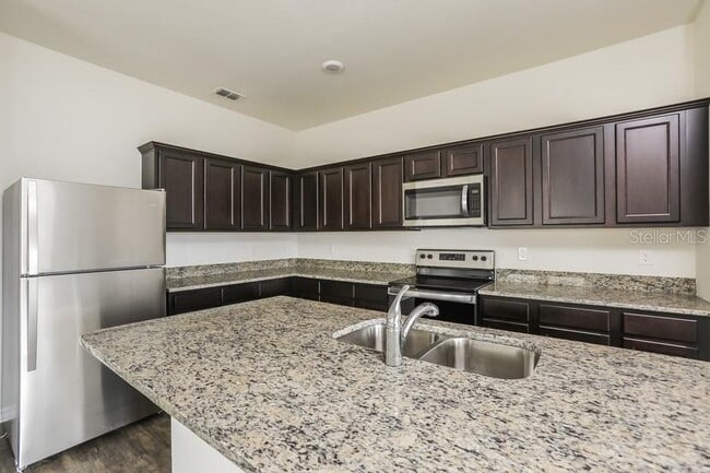 Building Photo - 3077 Neverland Dr
