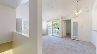 Located at 109 S Francisca Ave in Redondo Beach, California, this well-maintained one-bedroom, one-bathroom unit offers a thoughtfully arranged single-floor layout with a clean, neutral aesthetic throughout. The living room is anchored by plush carpeting and filled with natural light from a large sliding glass door that opens to a private balcony, offering pleasant outdoor views of surrounding greenery. A ceiling fan adds comfort to the airy space.

The kitchen is efficiently designed with light wood cabinetry, granite-style countertops, a stainless steel electric range, a stainless steel refrigerator, and a built-in dishwasher. A peninsula counter with a rounded edge connects the kitchen to the living area, creating an open, functional flow between spaces.

The bedroom features soft carpet, a window with outdoor views, and a sliding-door closet providing ample storage. An additional closet elsewhere in the unit further enhances storage options. The bathroom is finished with light wood-tone vinyl flooring, a bathtub/shower combination, and clean white fixtures, maintaining the unit's crisp, consistent palette.

Throughout the space, white walls and light-toned finishes create a bright and cohesive atmosphere, well-suited for comfortable everyday living in a sought-after coastal Southern California neighborhood.