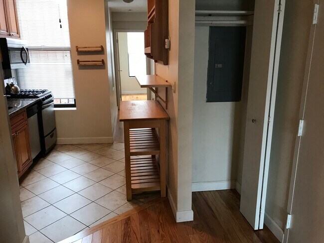 Coat closet leading into kitchen - 514 M St NW