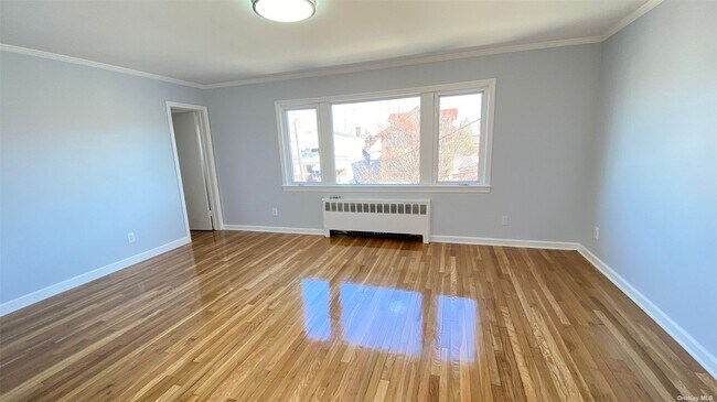 Building Photo - 137-12 63rd Ave