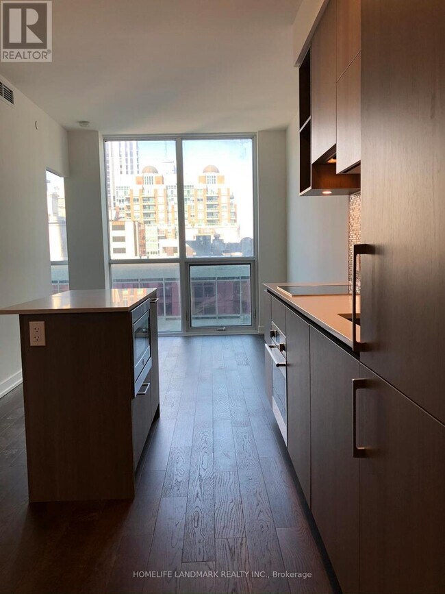 Photo du bâtiment - 1-701 Yorkville Ave