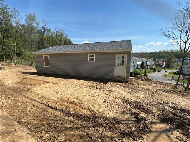 Building Photo - 102 Cedar Aly