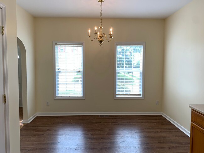 Building Photo - SPACIOUS HOME WITH DOWNSTAIRS PRIMARY BEDROOM AND BATH- LAKE WHEELER/ FARMER'S MARKET AREA