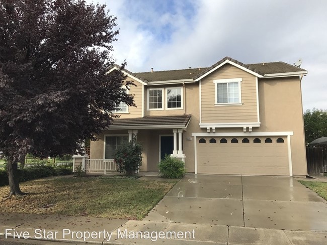 Building Photo - 4 br, 2.5 bath House - 3301 Wood Lily Ct