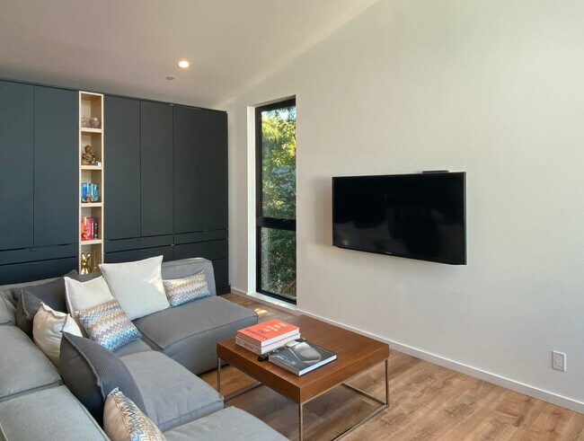 Living Room cabinets and TV wall. - 10815 Oregon Ave