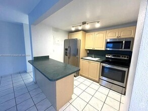 Building Photo - 4275 NW S Tamiami Canal Dr