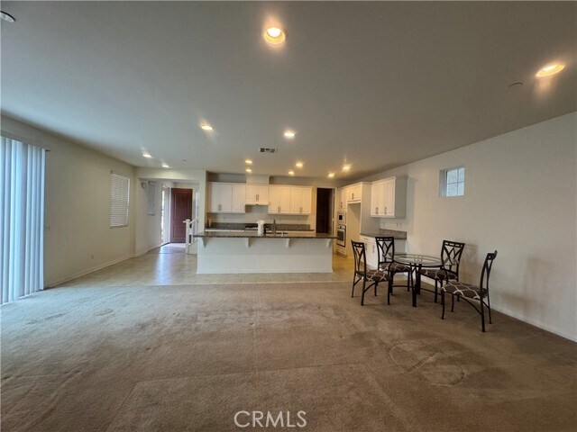 Foto del edificio - 6032 Rosewood Way