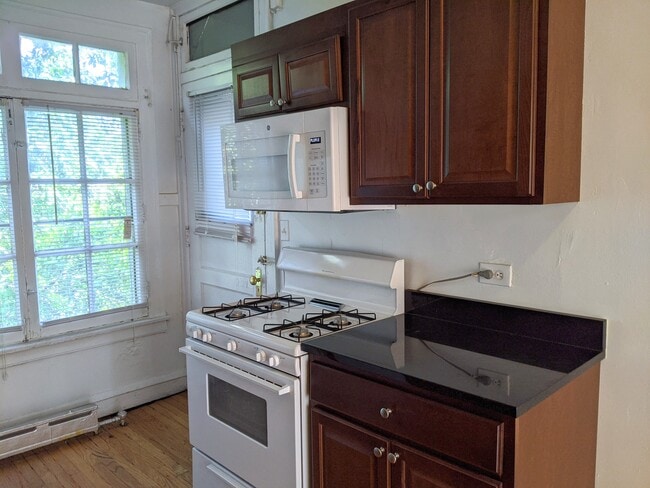 Gas stove and built in microwave - 911 Elmwood Ave