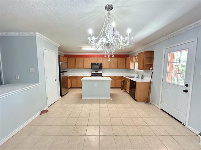 Foto del edificio - 8008 Hidden Oaks Dr