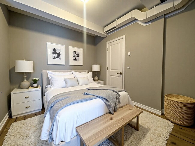 Building Photo - Private Balcony and HUGE windows at this 1...