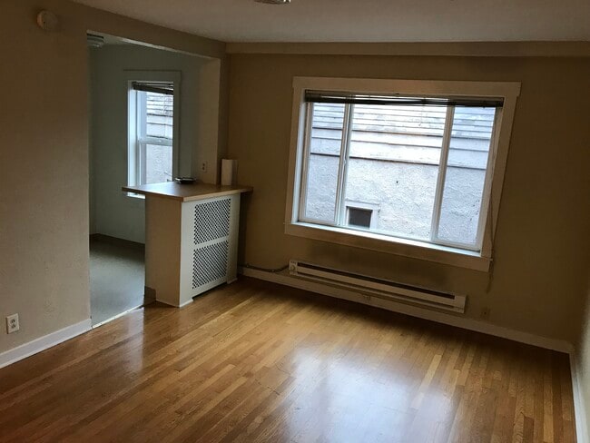 Living and dining - 221 Belmont Ave E