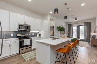 2BR, 2BA - 1,055SF | B1 - Living Area - The Mill Old Town