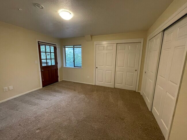 large bedroom, double closets, outside deoor onto deck - 104 Laguna Pl