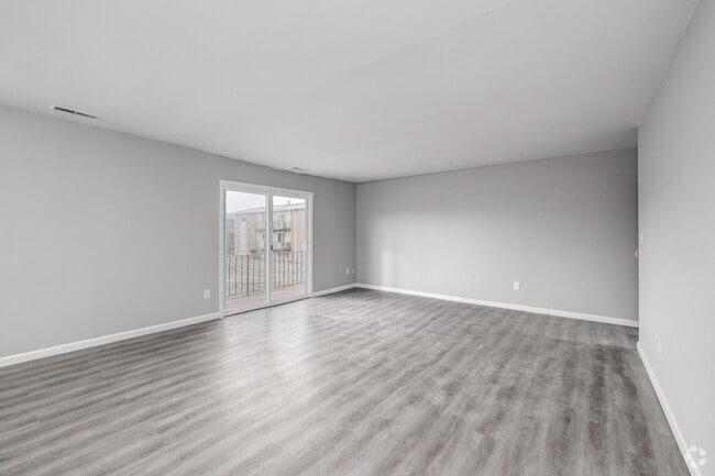 2BR, 1BA - 910SF - Living Room - Lansing Grove Apartments