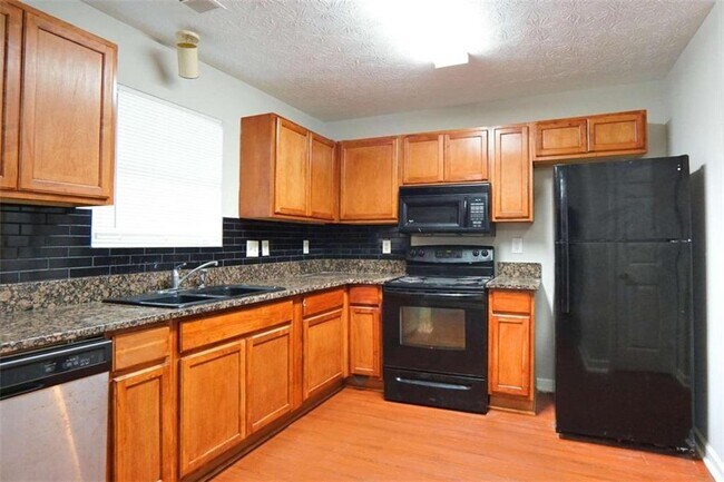 Building Photo - 5784 Wind Gate Ln