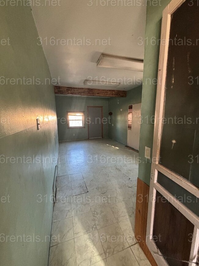 Building Photo - Three bedroom one bath available NOW!