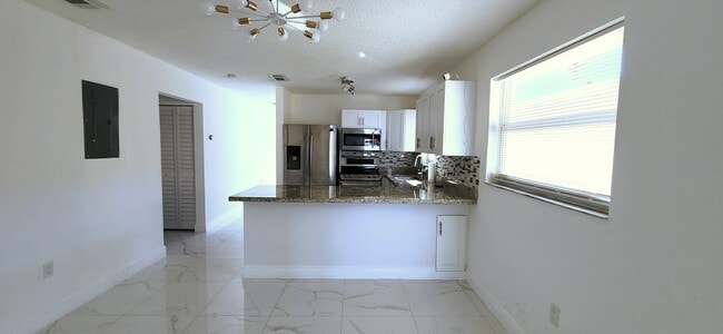 Photo - 1285 W 39th Pl House