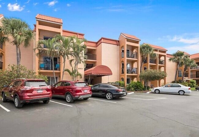 Gated community with 2 parking spots per condo - 8921 Blind Pass Rd