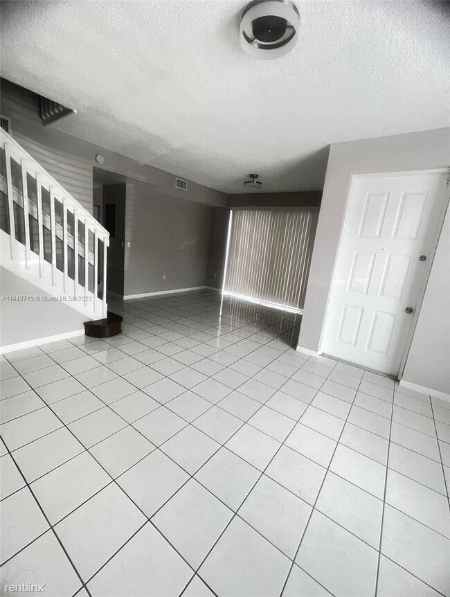 Building Photo - 3 br, 2.5 bath House - 8635 SW 152nd Ave A...