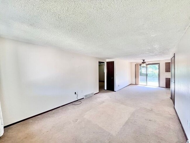 Building Photo - NEW PAINT, FLOORING & APPLIANCES! 2 Bedroo...