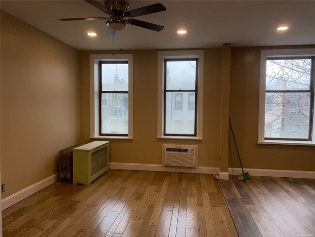 Building Photo - 62-24 60th Dr