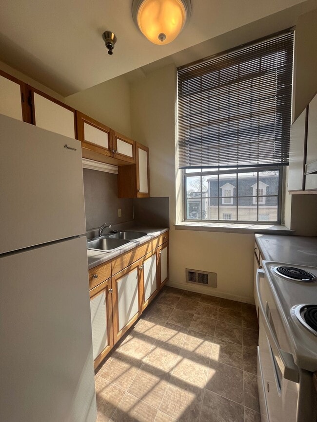 Unit 211 Kitchen - Woodlayne Court Apartments