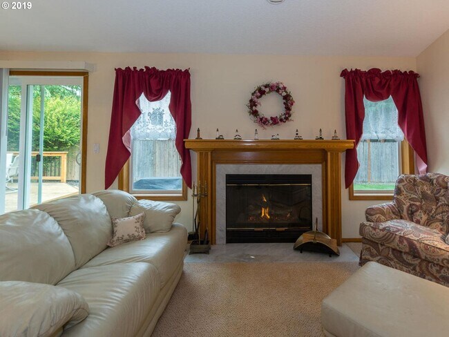 Building Photo - Charming 4-Bed, 2-Bath Home with Vaulted Ceilings, Dual Fireplaces & Serene Outdoor Spaces