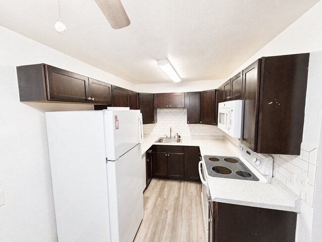 Photo - 6090 Olde Wadsworth Blvd Apartment