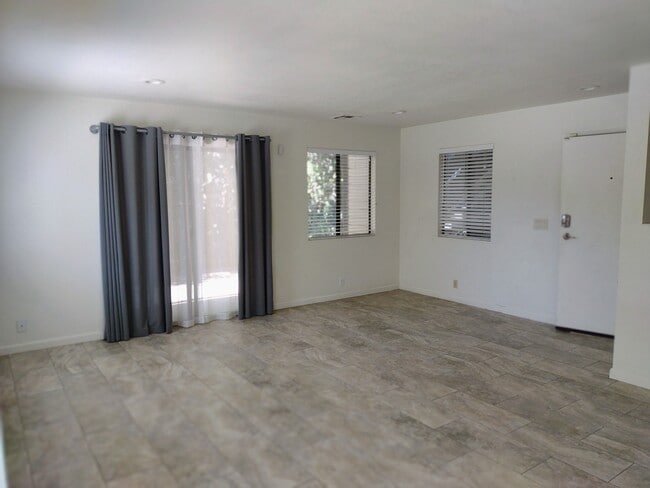 Front room with slider to creek - 75 Stenner St