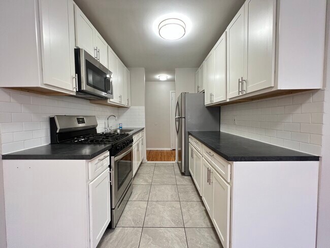 73 Western Ave 8 - 71 Western Ave