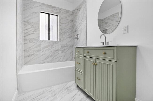 fully remodeled bathroom - 1185 S Tremaine Ave