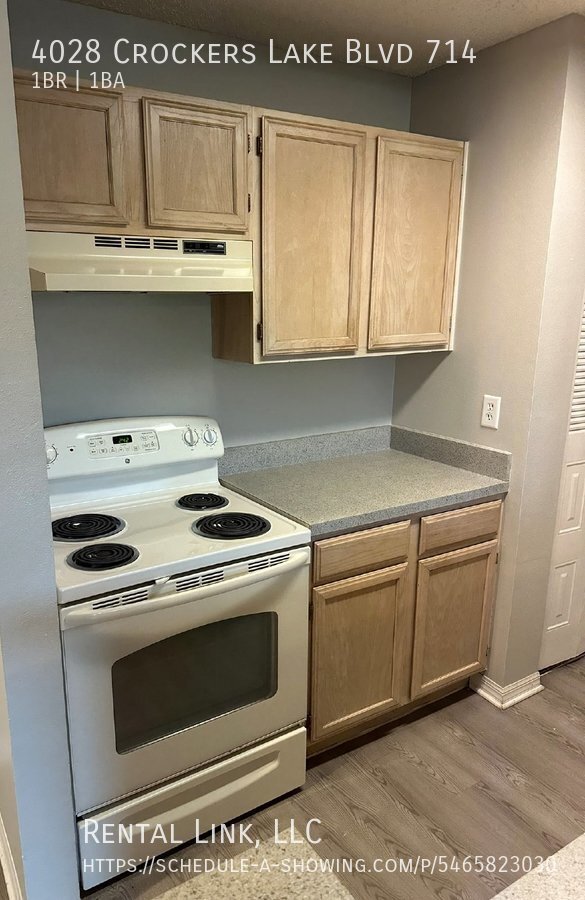 Building Photo - Charming 1-Bedroom Condo – Cozy Living in ...
