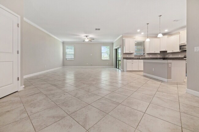 Foto del edificio - "Spacious 4-Bed Oasis with Granite Charm in Lutz!"In a gated community with 2 Cars garage