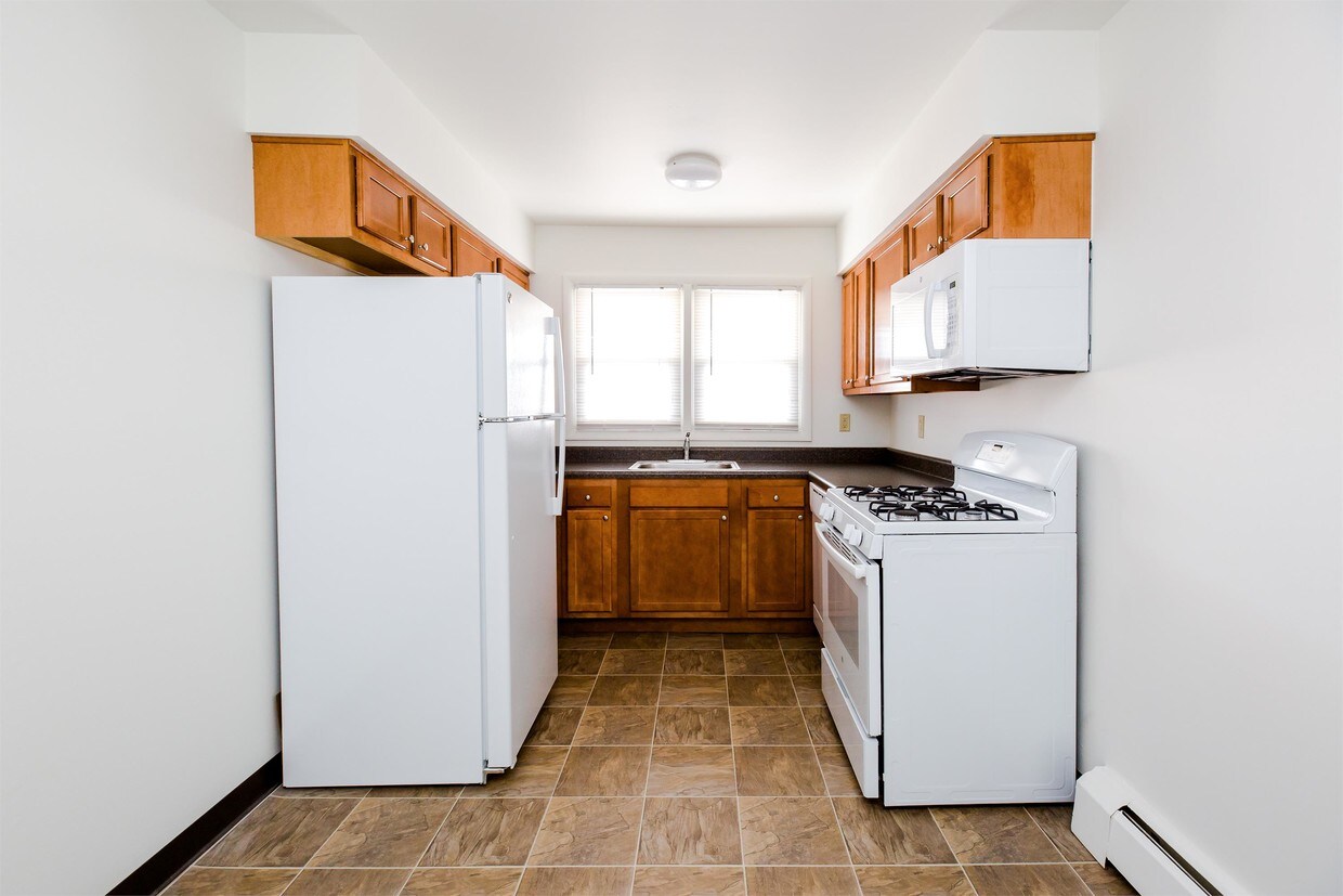 Building Photo - Cottage Street Apartments LLC - 55-1D
