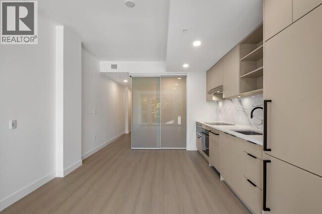 Photo du bâtiment - 422-422 E 3rd St