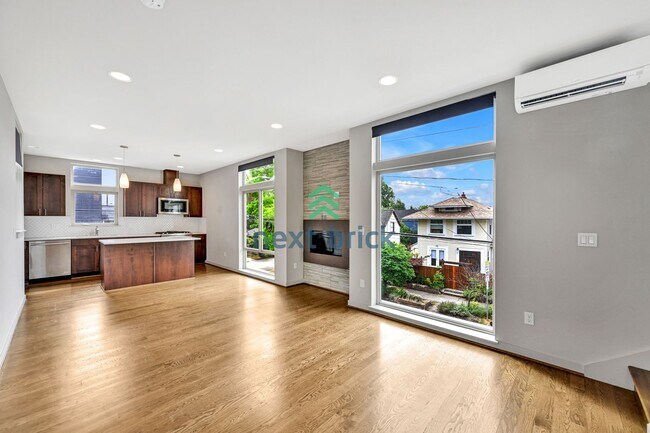 Building Photo - Sleek and Spacious Townhome with Gourmet K...