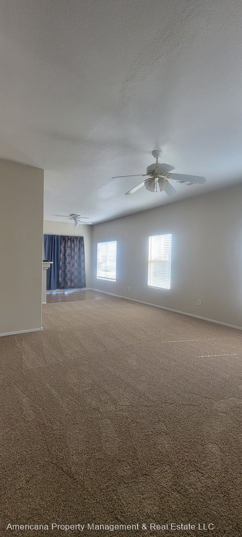 Building Photo - 2 br, 2.5 bath House - 6470 Saddle Up Ave ...
