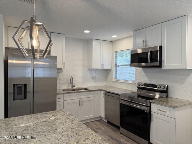 Building Photo - 7262 Kivler Dr